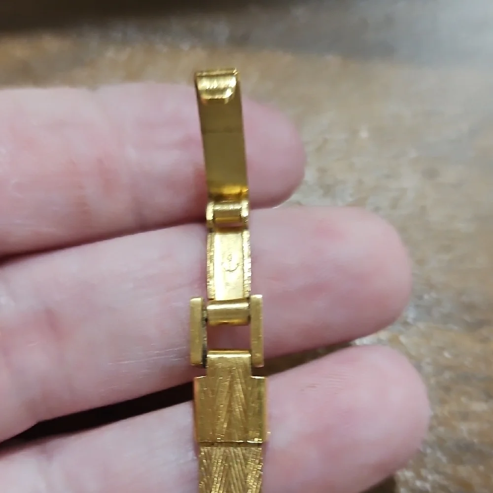 Vintage Lucian Piccard Goldtone Women's Watch with Crystal Detailing